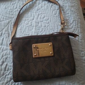 Used Micheal kors wristlet